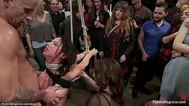 Brunette gets intimate in public setting