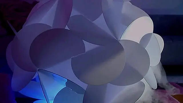 The two blonde teens are sitting on the couch with their soccer coach &mdash;  who happens to be a   